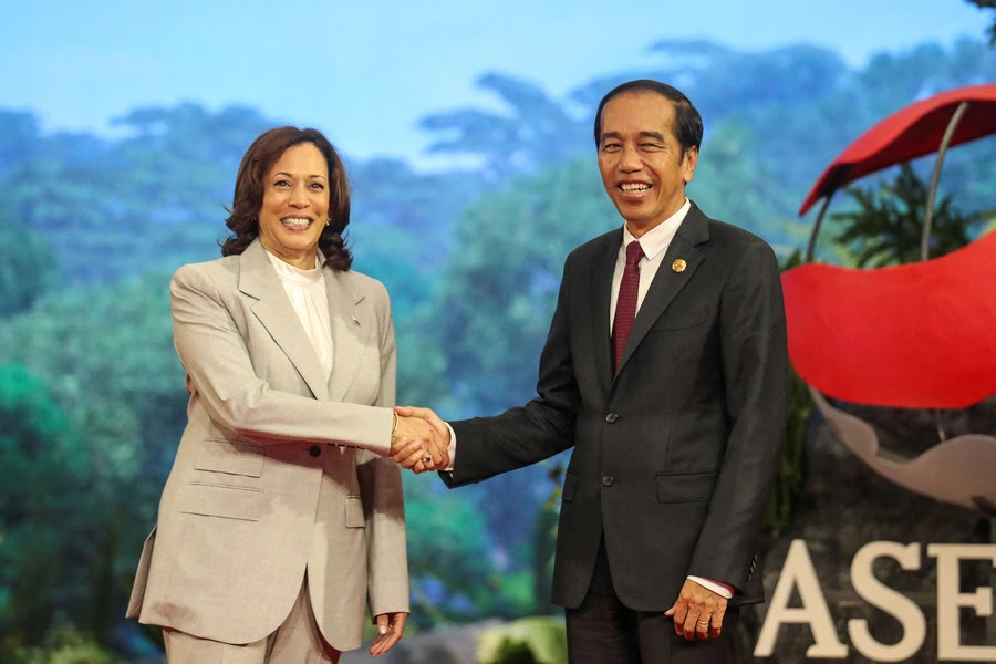 U.S. Vice President Kamala Harris is greeted by Indonesia's President Joko Widodo upon her arrival at the 43rd Association of Southeast Asian Nations (ASEAN) Summit in Jakarta, Indonesia