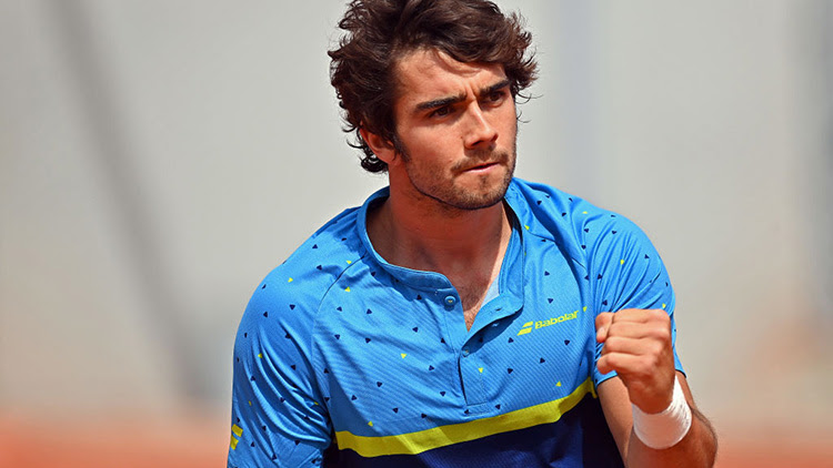 Daniel Caverzaschi of Spain reacts in the Men's Wheelchair Singles First Round at Roland Garros on May 31, 2022 in Paris, France. ©Aurelien Meunier/Getty Images