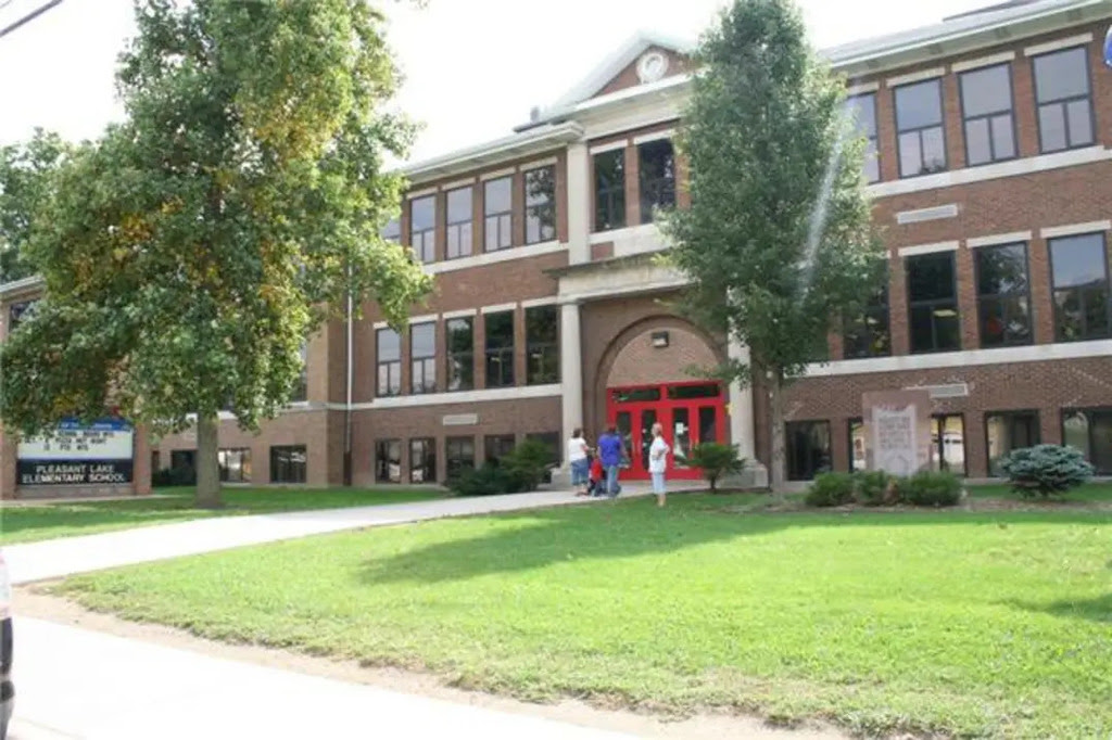 The exterior of a brick two-story elementary school building