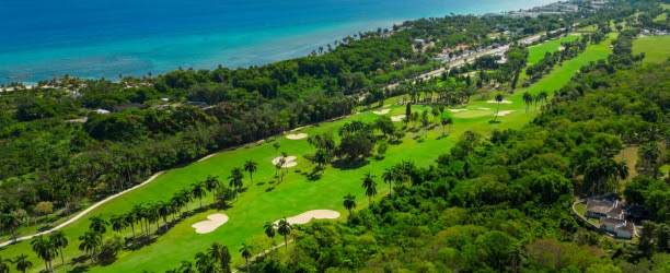Aerial shot of the Half Moon golf course with the Caribbean Sea in the background