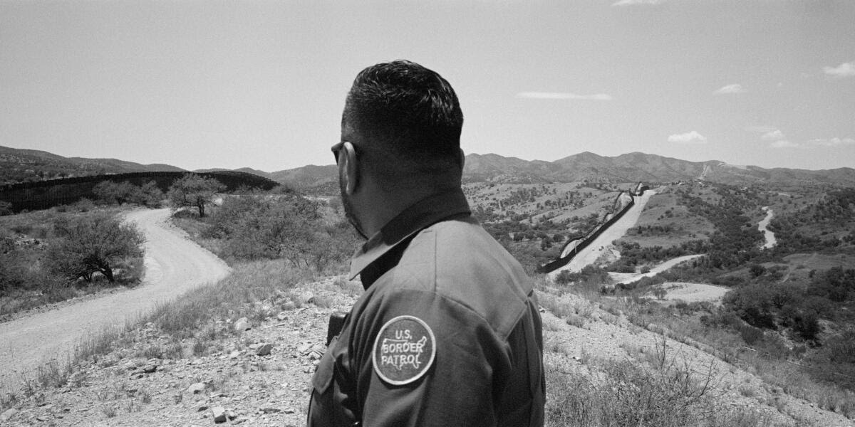 USA. Nogales. Arizona. July 2024. Border patrol officer Robert Ortiz at border
wall. Approximately 10% of migrants who cross attempt to evade Border Patrol.
Each year tens of thousands of migrants cross the harsh and often violent Sonora
desert who have paid Mexican cartels for passage through “their” territory often
suffering extortion, rape, and abandonment. Some are also subject to violence and intimidation of US-based militia groups who “tour” the region for migrants. According to Migration Data Portal, the border between Mexico and the United States is the second deadliest land crossing in the world with 5,289 known deaths to date. Numbers of migrants seeking safety and a sustainable future have sky rocketed in recent years causing US presidential candidates from both parties to cater to a public sentiment for “stronger security”.