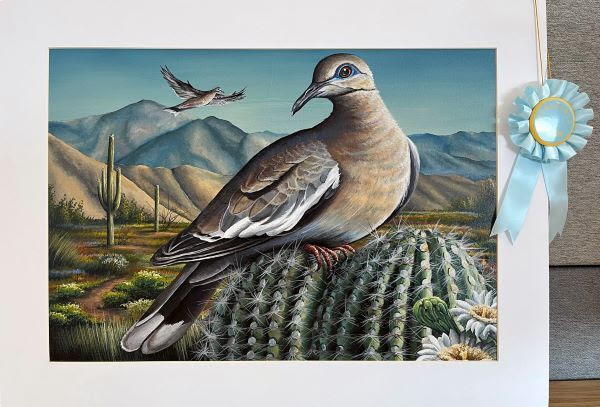 Painting of dove on cactus with dove flying behind.