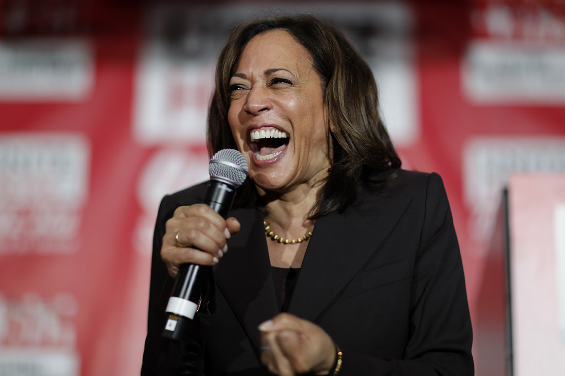 Photo of Kamala Harris laughing.