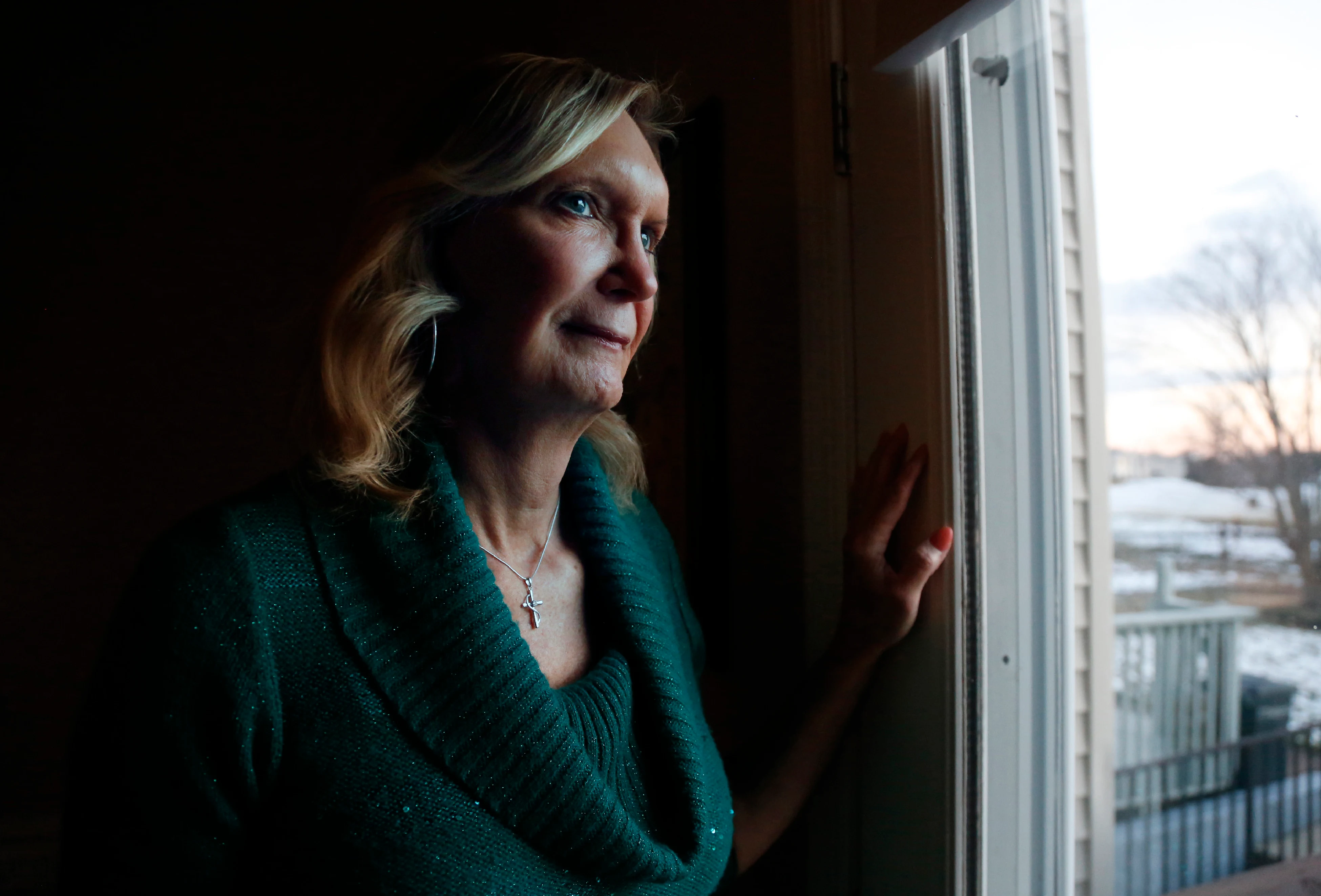 Christine Zuba poses for a portrait at her home in Blackwood, New Jersey.