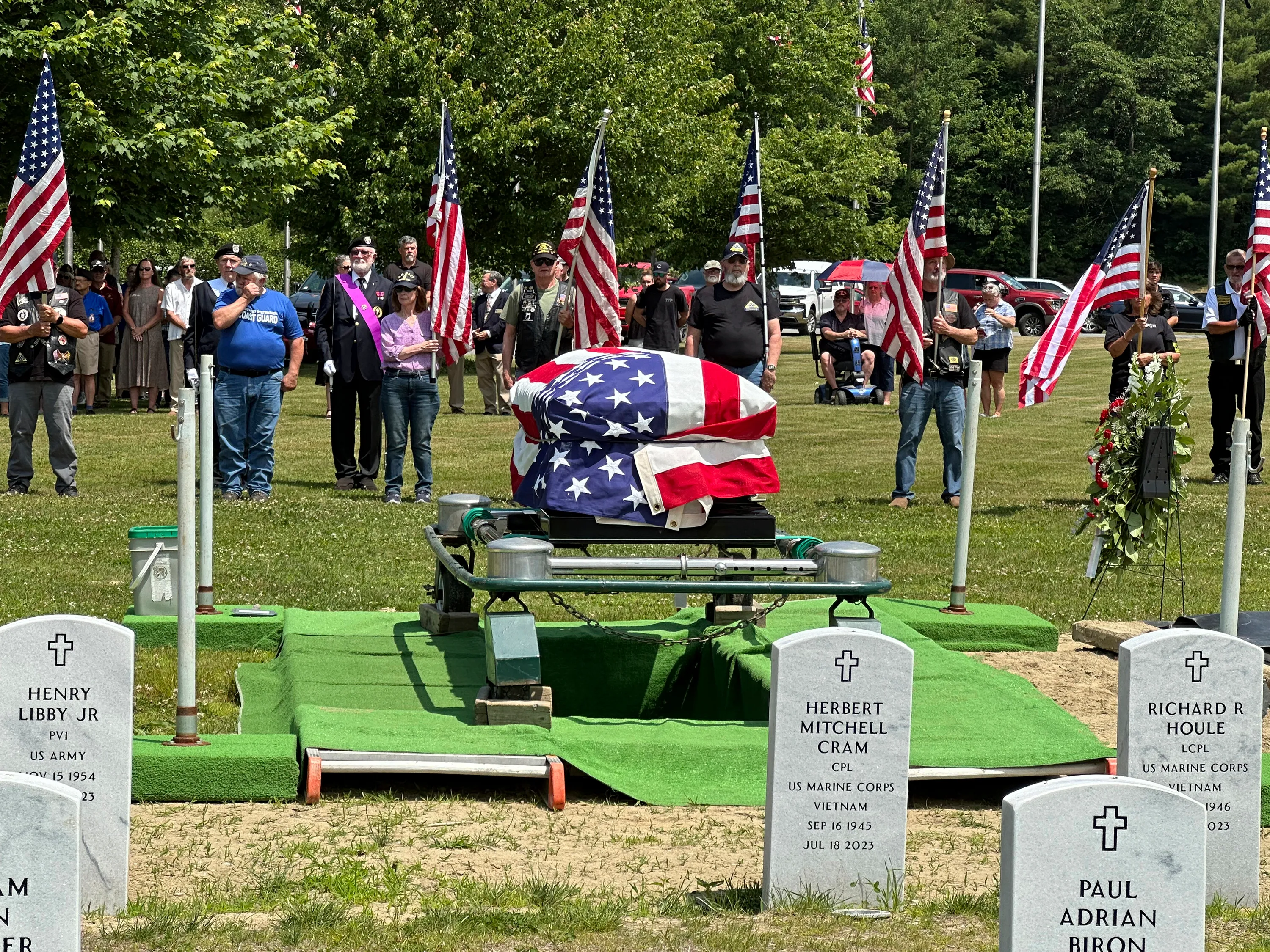 Former U.S. Marine Gerry Brooks is laid to rest Thursday at the Maine Veterans Memorial Cemetery in Augusta, Maine.