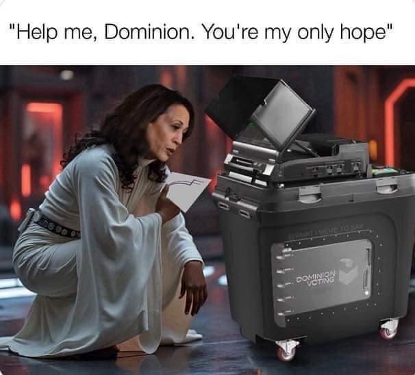 Kamala praying to Dominion machine.