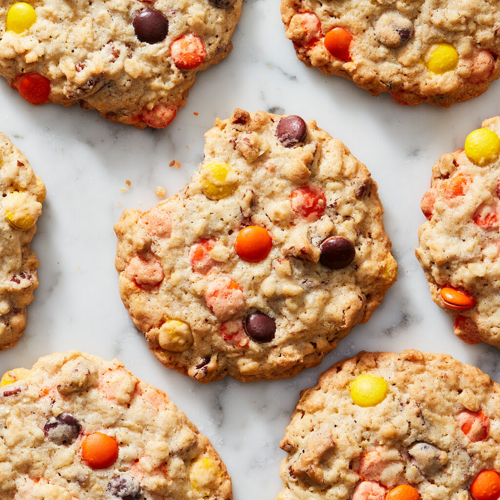 Cookies with colorful chips embedded in them.