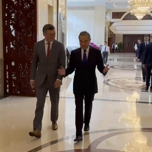 In this image taken from video released by the Ukraine Ministry of Foreign Affairs, Ukraine's Foreign Ministry Dmytro Kuleba, left walks with China's Foreign Minister Wang Yi before a meeting in the southern Chinese city of Guangzhou on Wednesday, July 24, 2024. Ukraine's foreign minister says he is seeking "common ground" in talks with his Chinese counterpart on ending his country's war with Russia. It is the first visit by a Ukrainian foreign minister since the war started in 2022. (Ukraine's Ministry of Foreign Affairs via AP)