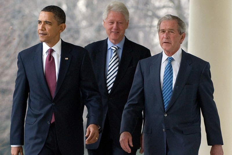 Then-U.S. President Barack Obama walks alongside former U.S. Presidents Bill Clinton and George W. Bush before speaking in the Rose Garden of the White House in Washington, D.C., on Jan. 16, 2010.