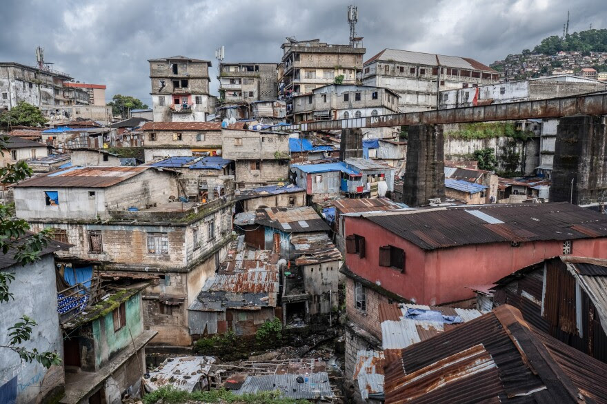 Buildings on a hillside in the Susan's Bay neighborhood of central Freetown, Sierra Leone. Many residents have turned to kush as a cheap and accessible escape from lives of grinding poverty.