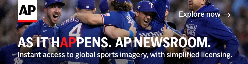 Texas rangers players celebrating at the World Series with the text: As it happens. AP Newsroom. Instant access to global sports imagery, with simplified licensing.