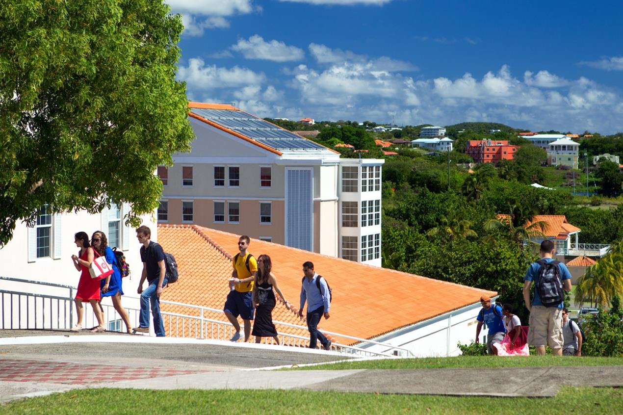 Students walking by buildings
