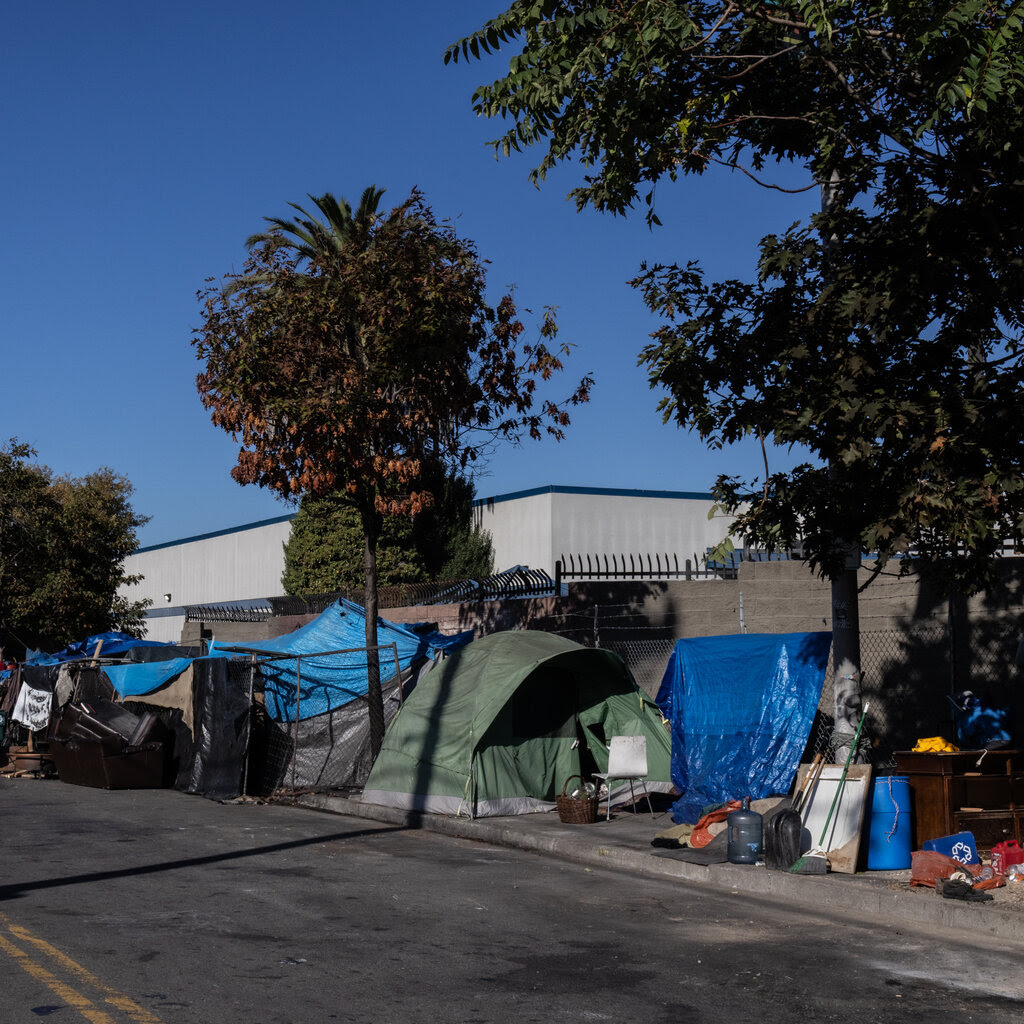 Tents near a road. 