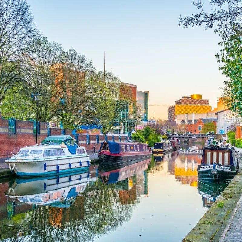 Birmingham canals with boats during sunset