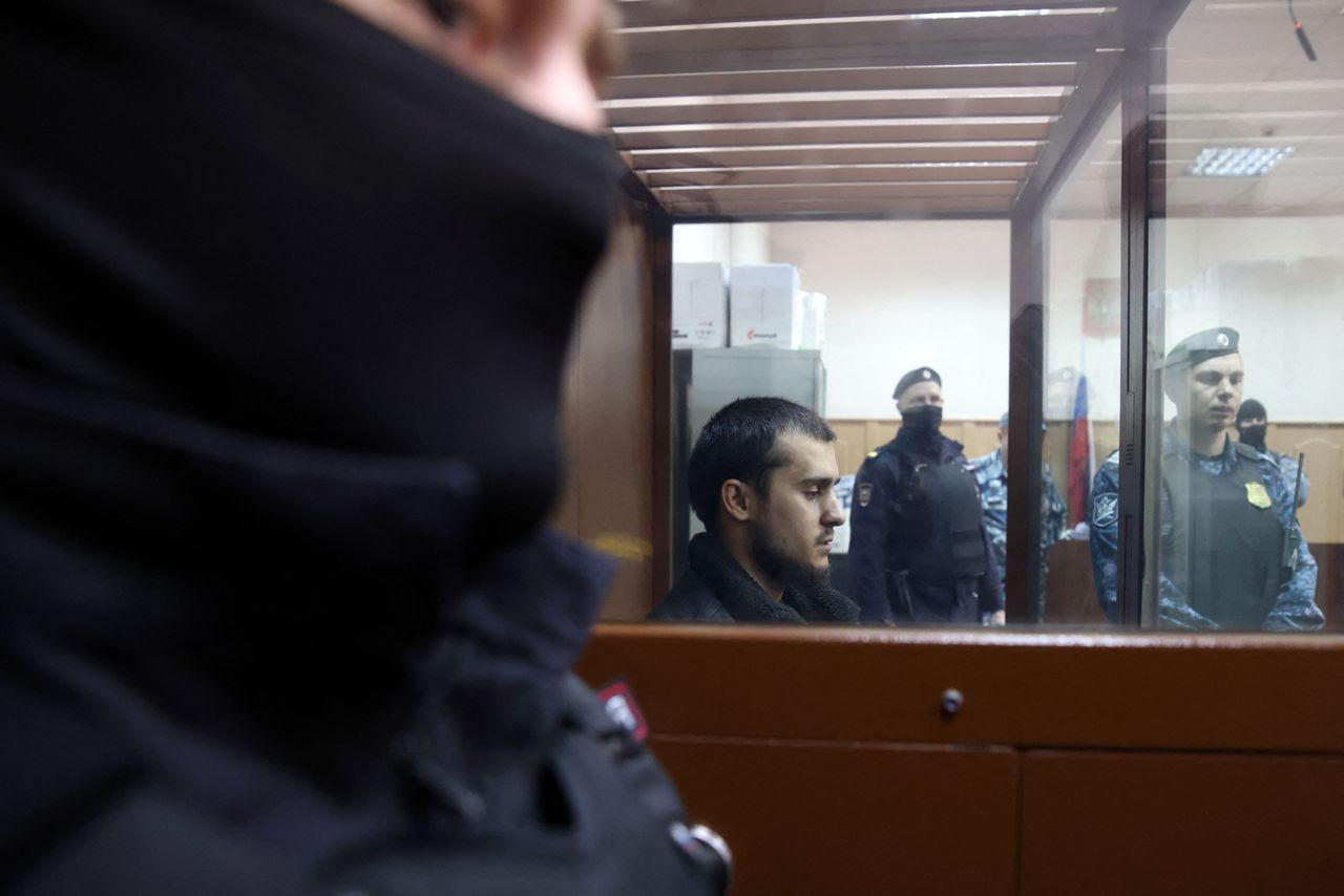 Dilovar Islomov, suspected of taking part in the attack on a suburban Moscow concert hall that killed 139 people, awaits his pretrial detention hearing on Monday. (Tatyana Makeyeva/AFP/Getty Images)