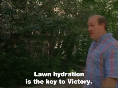Man talking to his gardening team.  He said, Lawn hydration is the key to Victory. Too much water can wipe out all that we've worked for.