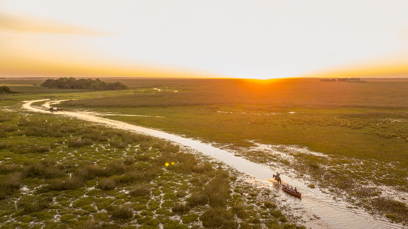 Tourists immersed in Iberá from a horse-drawn canoe. Photo credit: Matias Rebak