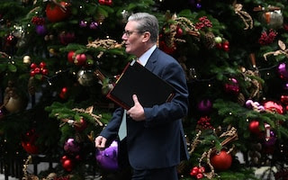 Keir Starmer in front of a Christmas tree