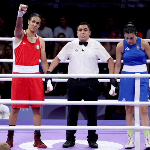 epa11515326 Imane Khelif (L) of Algeria is declared winner aber Angela Carini of Italy abandoned their bout in the Women 66kg preliminaries round of 16 against Imane Khelif of the Boxing competitions in the Paris 2024 Olympic Games, at the North Paris Arena in Villepinte, France, 01 August 2024. EPA/YAHYA ARHAB