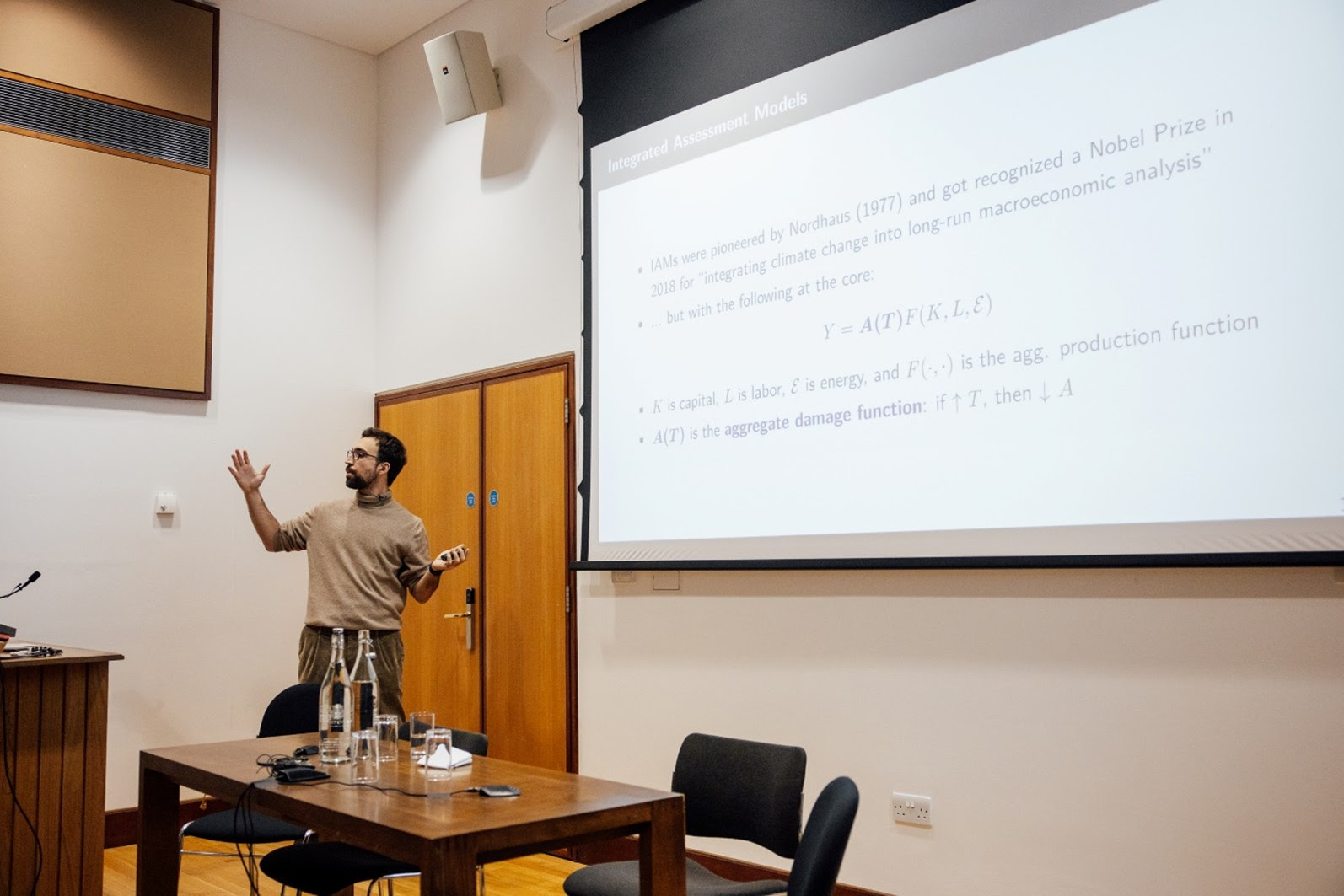 Prof Andrea Chiavari delivering a keynote lecture at Oxford’s WERD Series, addressing the economic impacts of climate change and carbon taxation.