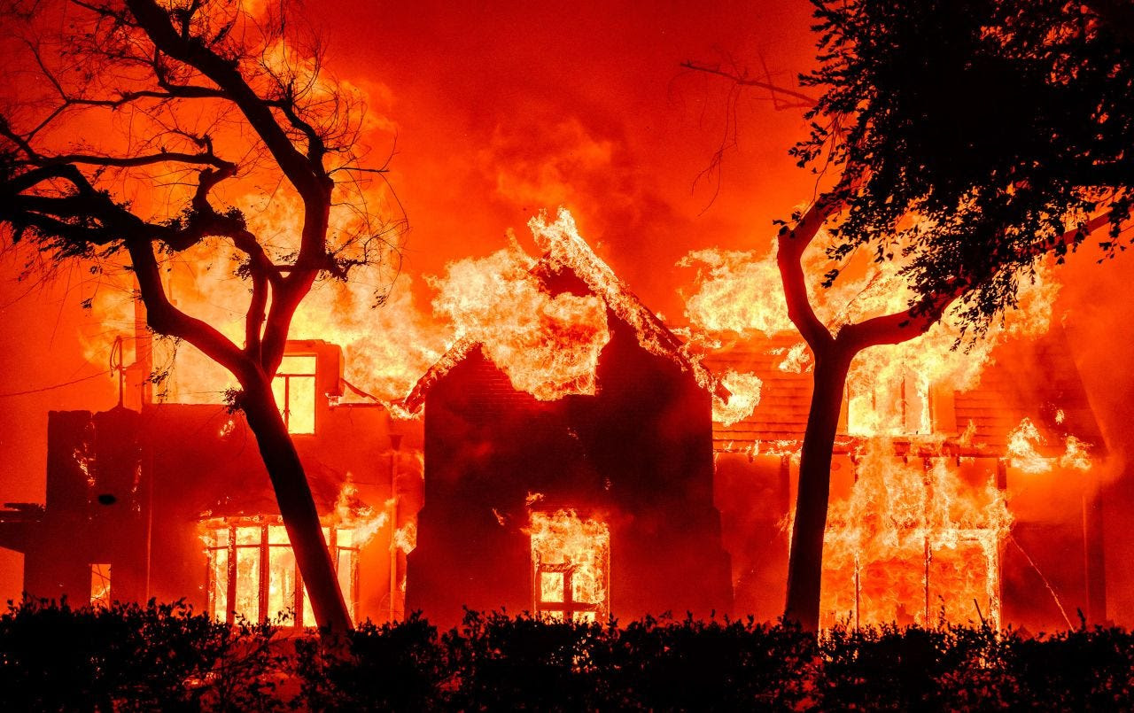A home is engulfed in flames by the Eaton Fire in Altadena on Wednesday. A home is engulfed in flames by the Eaton Fire in Altadena on Wednesday.