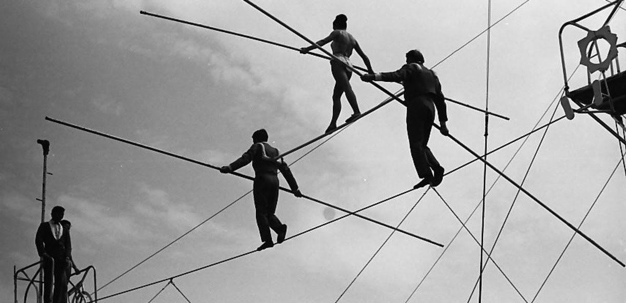 image of tightrope walkers