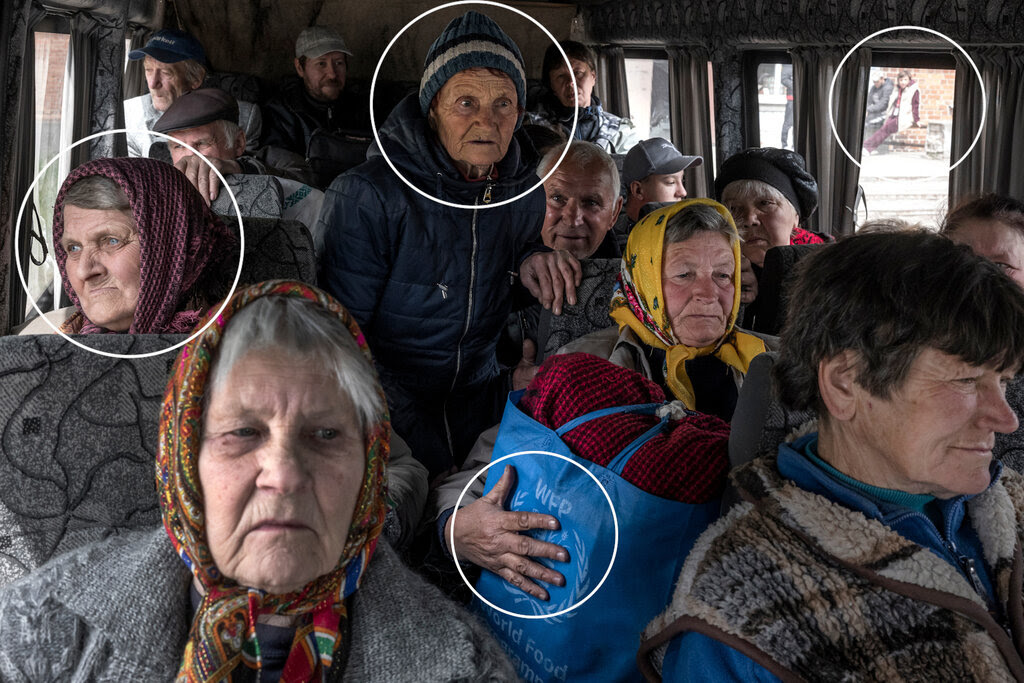a photo of older people on a bus. many women wear head-scarves and hold bags. others are looking out the window. they look weather-beaten and sad. 