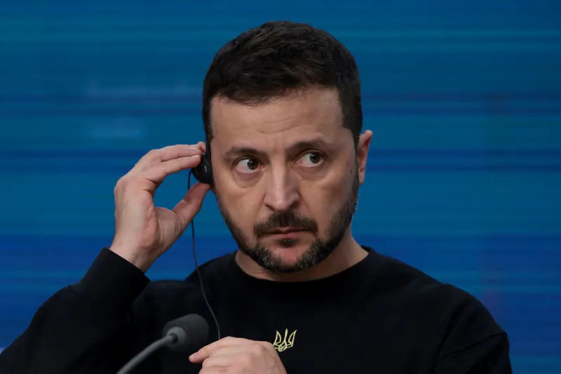 Ukrainian President Volodymyr Zelensky speaks to the media at a press conference during a European Council session on Oct. 17.