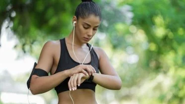 Woman Exercising With Smartwatch