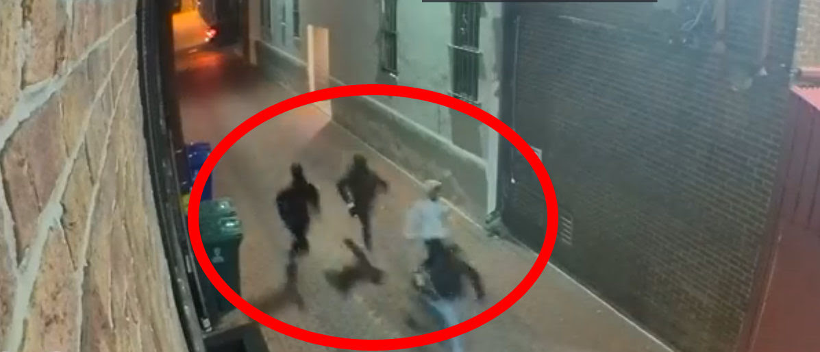 Four individuals are seen fleeing a murder scene on surveillance video in Washington, D.C. (Screenshot/Fox 5 DC)
