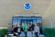 The Row 34 team stands outside of NOAA Fisheries in Woods Hole. Credit: NOAA Fisheries/Brianna Shaughnessy