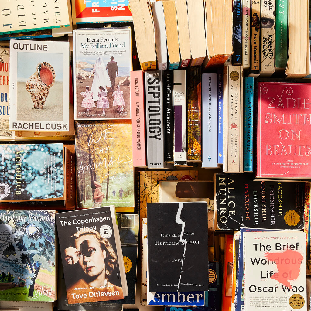 A spread of paperback books.