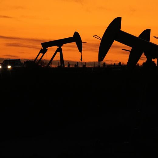 Oil Pump jacks work at dusk near Barnes City, Texas, Wednesday, Nov. 1, 2023. Despite frequent and devastating heat waves, droughts, floods and fire, major fossil fuel-producing countries still plan to extract more than double the amount of fossil fuels in 2030 than is consistent with the Paris climate accord?s goal for limiting global temperature rise, according to a U.N.-backed study released Wednesday, Nov. 8. (AP Photo/Eric Gay)