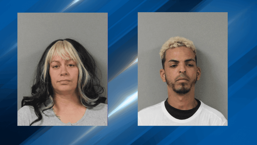 Two arrested, accused of leaving children in vehicle for hours while gambling