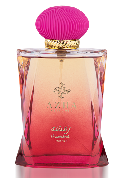 A pink and gold perfume bottleDescription automatically generated