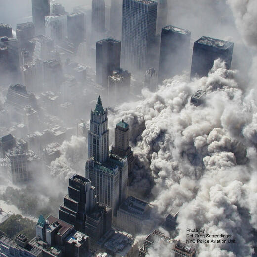 This photo taken Sept. 11, 2001 by the New York City Police Department and obtained by ABC News, which claims to have obtained it under the Freedom of Information Act, shows smoke and ash engulfing the area around the World Trade Center in New York. (AP Photo/NYPD via ABC News, Det. Greg Semendinger) MANDATORY CREDIT