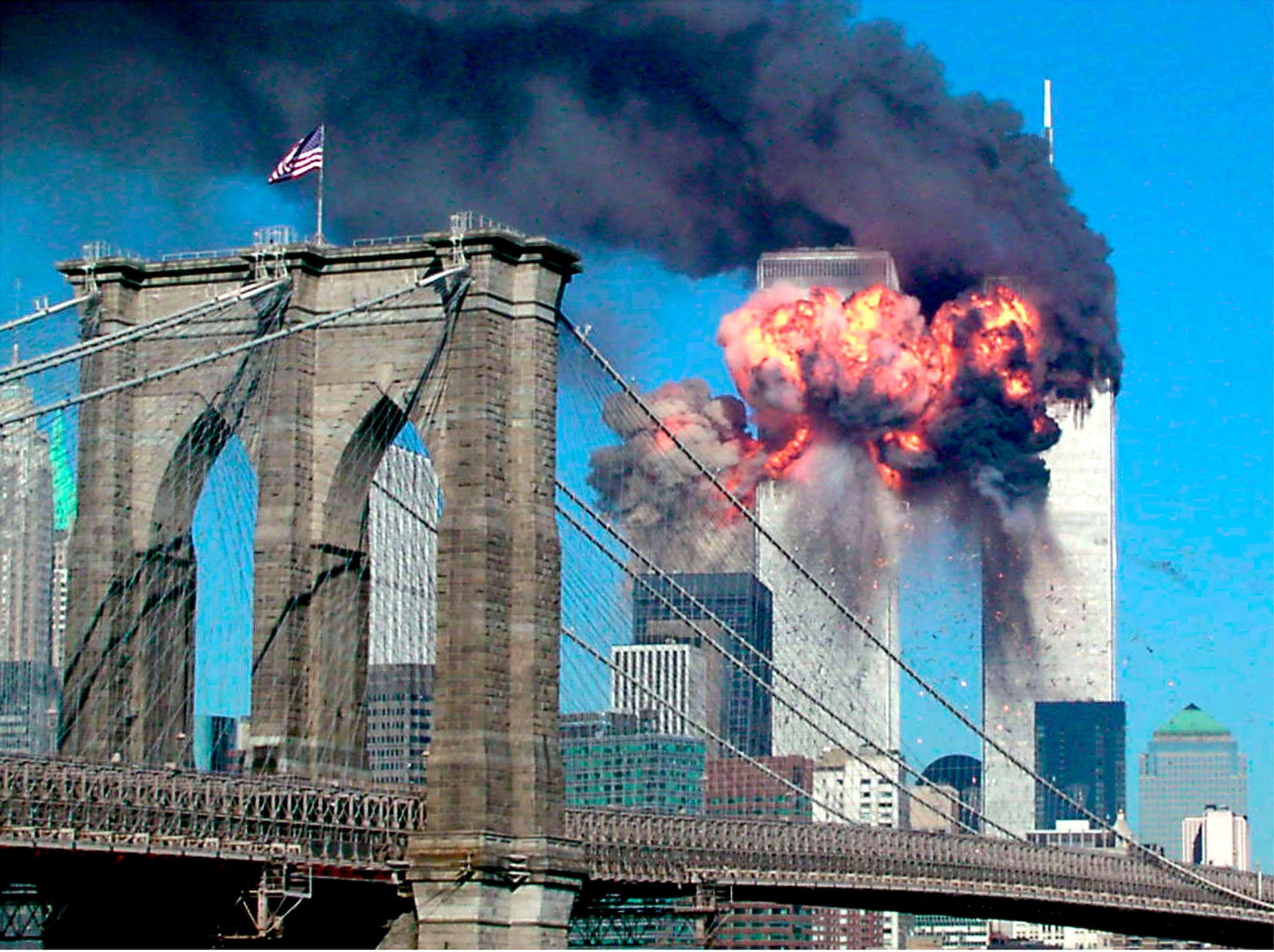 The second tower of the World Trade Center bursts into flames after being hit by a hijacked airplane, September 11, 2001.