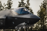 Close-up of the cockpit of an F-35A fighter aircraft as it lands on a highway in Finland.