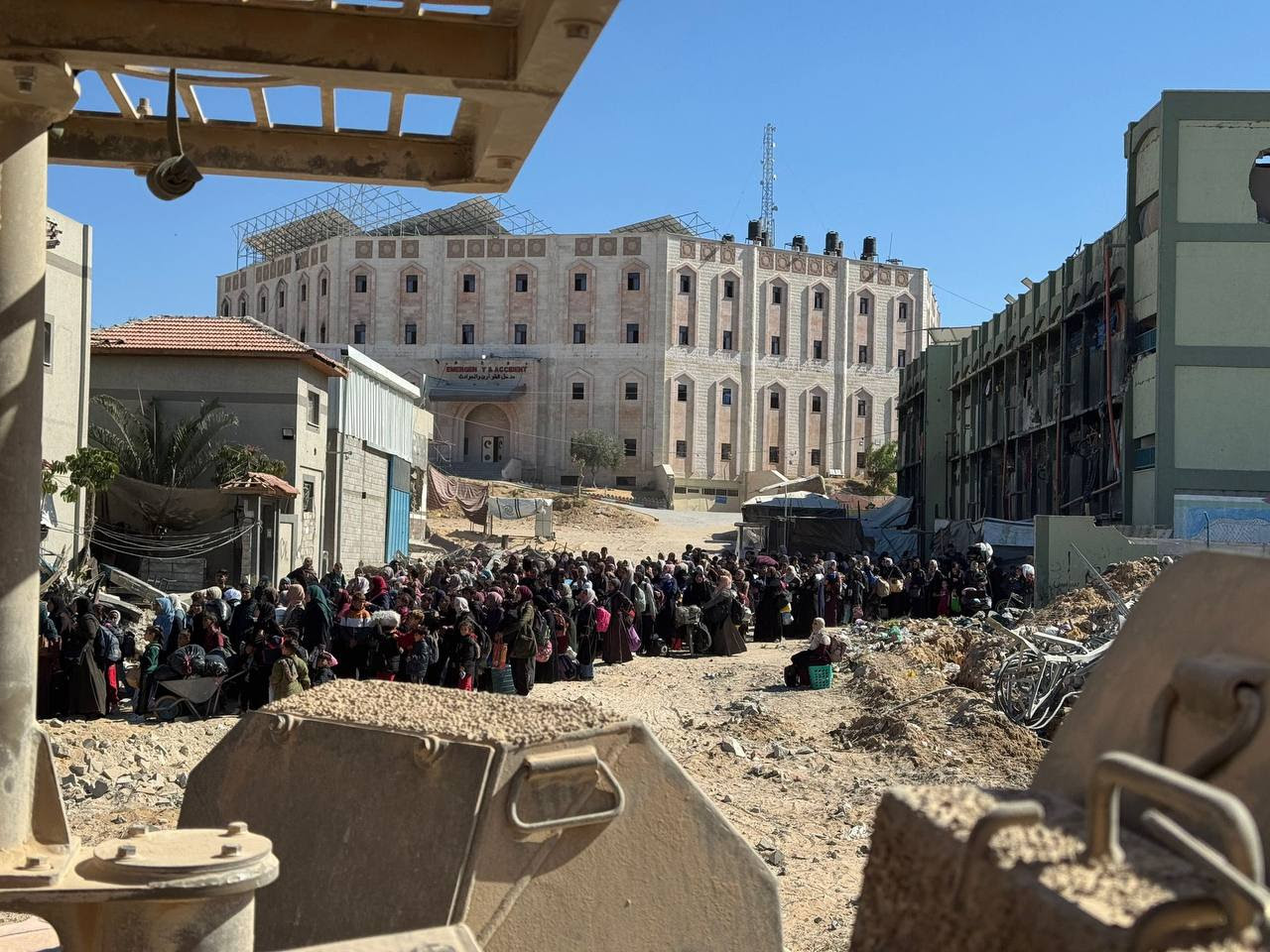 The Israeli army rounds up Palestinians at gunpoint near the Indonesian Hospital in Beit Lahiya, northern Gaza Strip. (X/AvichayAdraee)