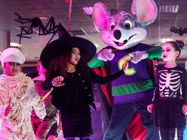 Chuck E. & kids in costume dancing at DJ Munch’s Haunted House Party