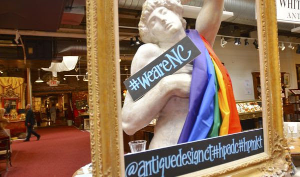 In this April 16, 2016, photo, a statue draped in a rainbow flag showing support against HB2, North Carolina&#x27;s law on LGBT rights, is displayed at Whitehall Antiques showroom located in the Suites at Market Square, in High Point, N.C. (Jessica Nuzzo/The Enterprise via AP) **FILE**