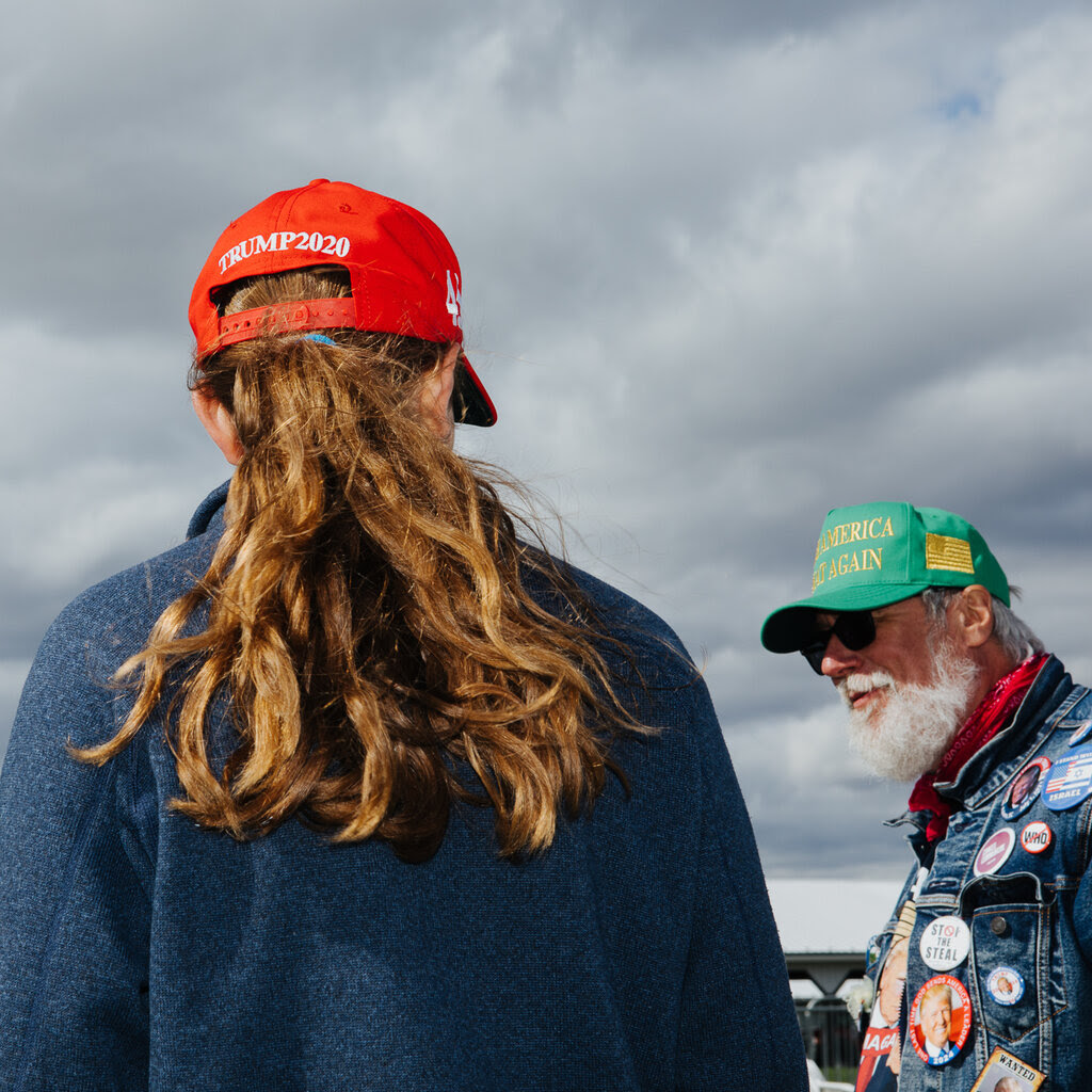 Supporters of former President Donald J. Trump are seen at a rally in Schnecksville, Pa.