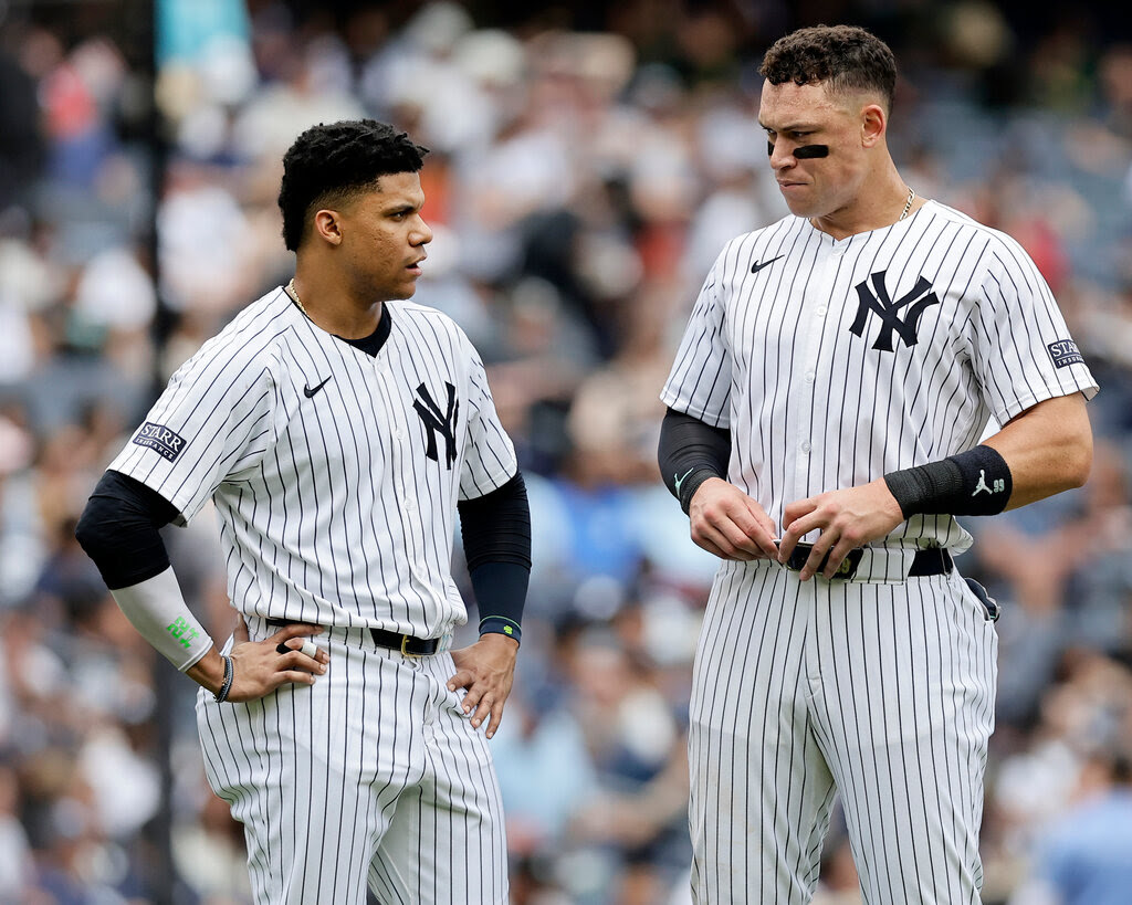 Juan Soto and Aaron Judge wearing New York Yankees uniforms.