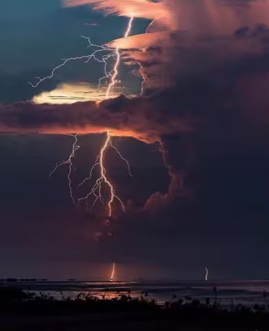 Lightning-through-layers-of-clouds