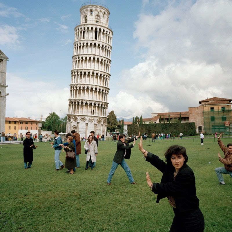 Tourists with the Leaning Tower of Pisa.