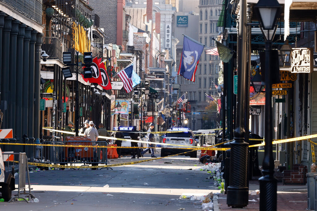 A street blocked off with police tape.