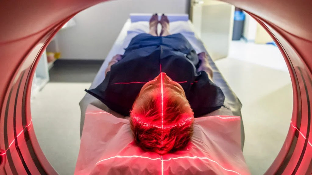 a person having a medical scan to detect pseudodementia