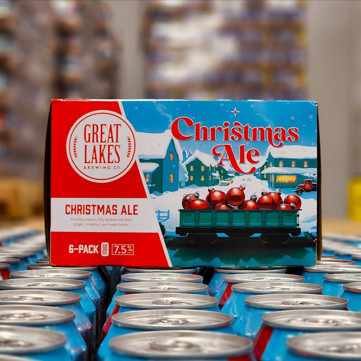 Christmas Ale can 6-Pack placed on a pallet row of Christmas Ale cans at the Great Lakes warehouse.