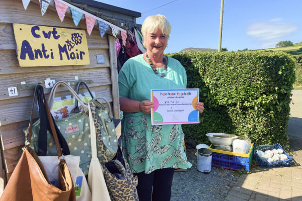 photo of a women and a shed