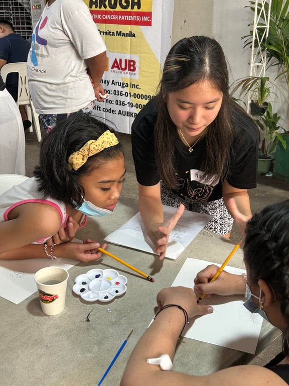 Nikki Go with the kids of Bahay Aruga